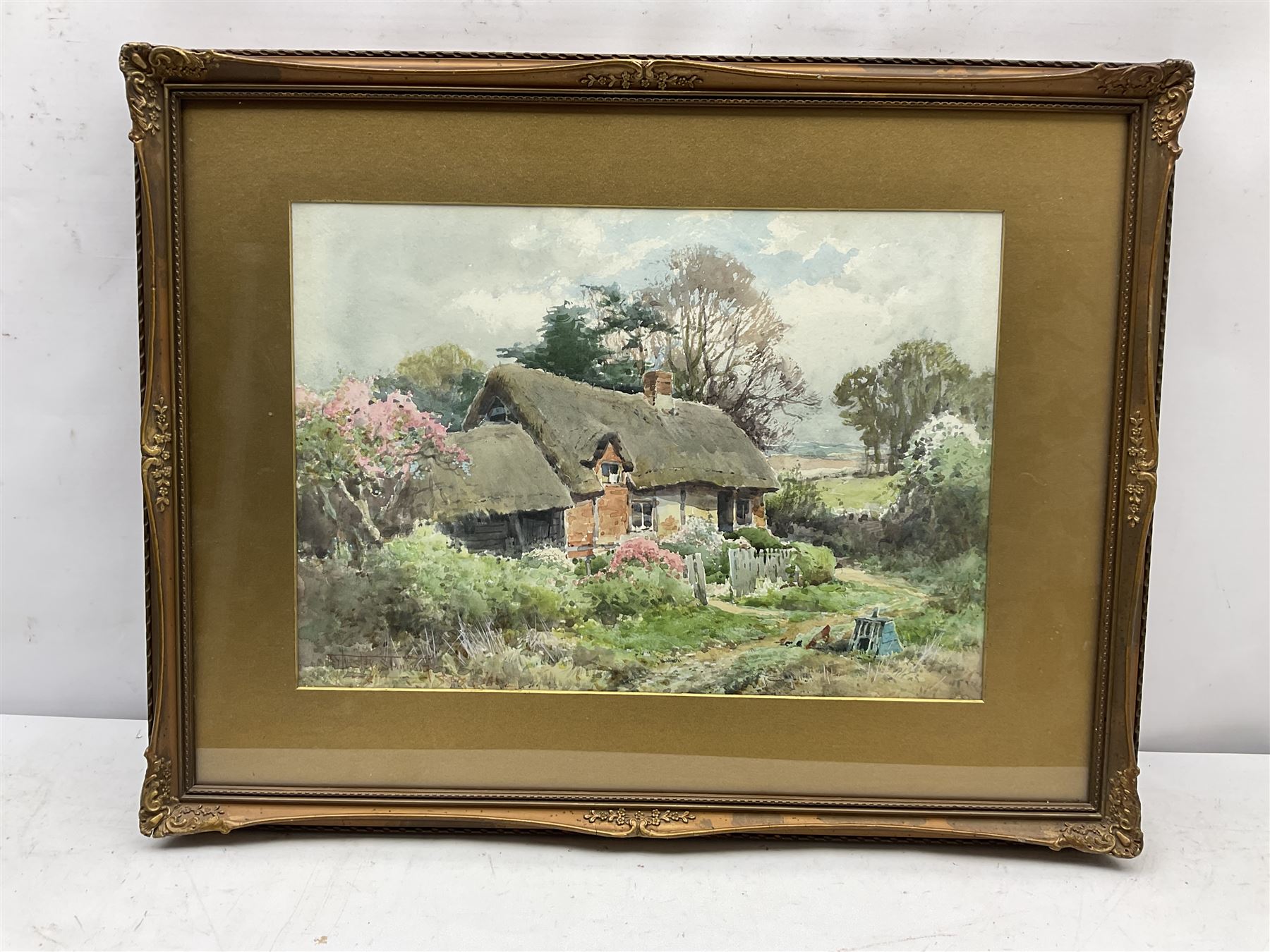 Henry John Sylvester Stannard (British 1870-1951): Country Cottage, watercolour signed 26cm x 38cm