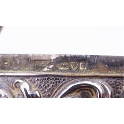 Edwardian silver card case, of typical rectangular form, with embossed floral and scrolling decoration throughout, engraved with monogrammed initials to front cover, hallmarked Cornelius Desormeaux Saunders & James Francis Hollings (Frank) Shepherd, Chester 1903, H9.7cm