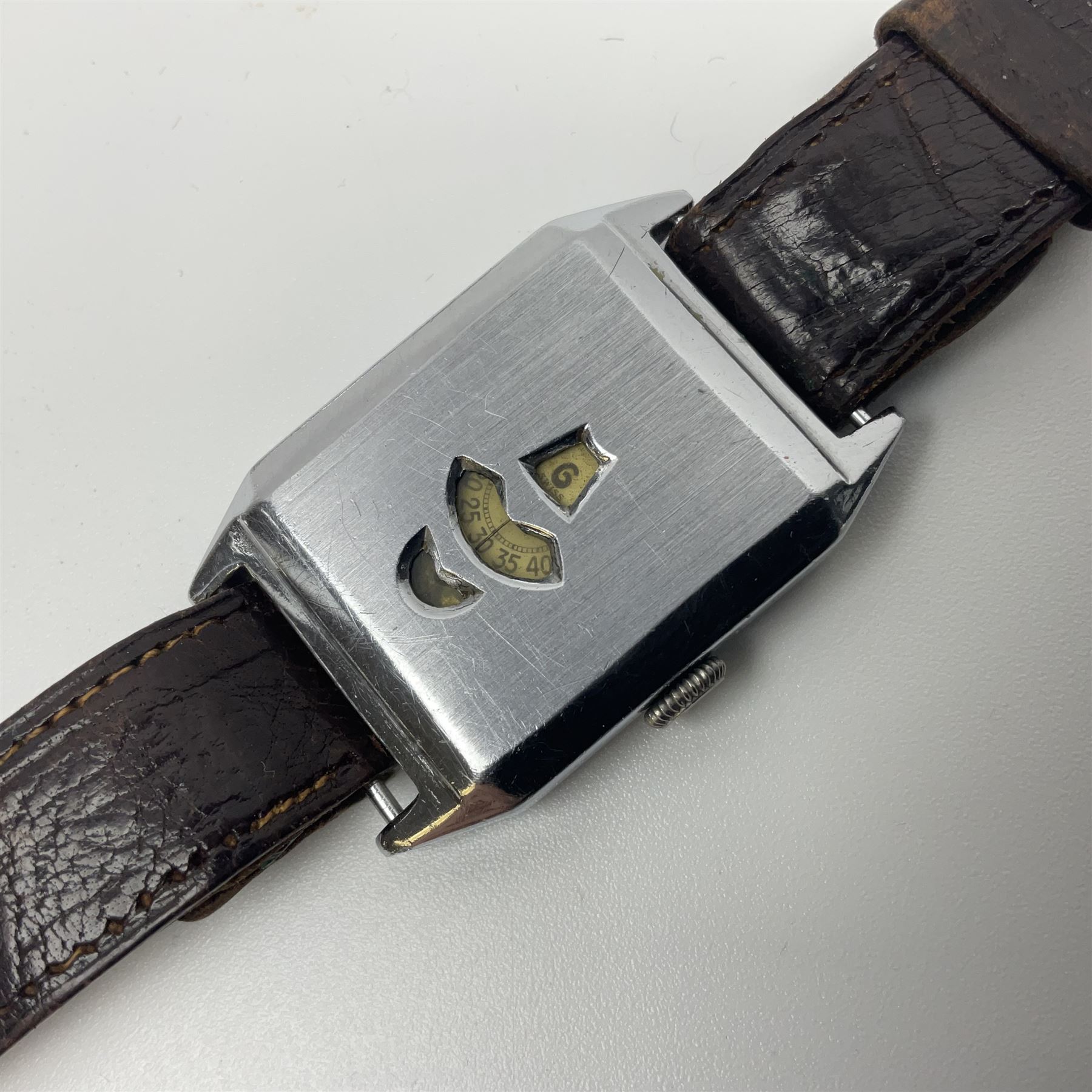 Cyma military issue pocket watch, back case No. 6E/50 A9259 and a Art Deco manual wind jump hour wristwatch