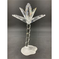 Swarovski Crystal animals, comprising camel and lion, both upon frosted crystal bases, together with Swarovski Crystal palm tree, upon similar frosted crystal base, tallest H14cm