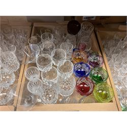 Quantity of cut and moulded glassware to include decanters with spirit labels, set of six flashed hock glasses, other flashed coloured glassware, glass pedestal footed bowl, tumblers, wine glasses etc in five boxes