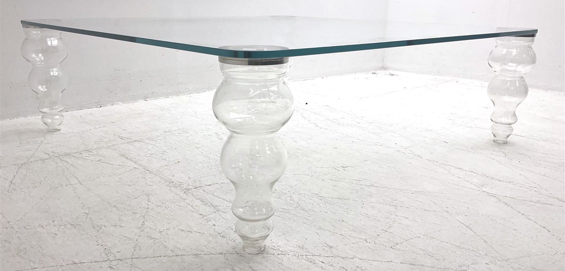 Gallotti and Radice - contemporary glass coffee table, rounded square top on turned vasiform glazed supports 