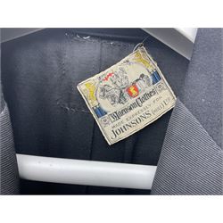 Two gentlemen's vintage black morning jackets, together with pair of suit trousers and waistcoat, and a black mess jacket with label detailed 'Made expressly for Johnsons (Hull) Ltd', (3)