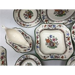 Copeland Spode part dinner service decorated in the Chinese Rose pattern, comprising lidded tureen, six dinner plates, six side plates, four bowls, and sauce boat and stand