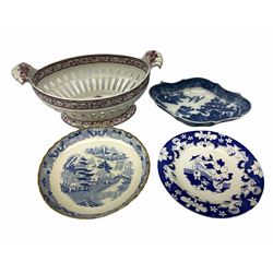 Group of 19th century ceramics, comprising Staffordshire pearlware chestnut basket, possibly Davenport, with twin handles, pierced sides, and transfer printed decoration in puce, H13.5cm L30cm, Spode Willow pattern dessert dish of shaped lozenge form, with impressed mark beneath, L23cm, Miles Mason Willow pattern dish, and a Rogers plate decorated with a figure under a parasol within a fenced garden, with impressed mark beneath. (4).