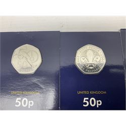 Queen Elizabeth II United Kingdom commemorative coins, including seven fifty pence coins and 2017 'Century of The House of Windsor' five pound coin, each housed on Change Checker card