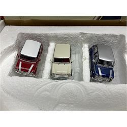 Two Bburago 1:18 scale die-cast models - Volkswagen New Beetle 1998 and Volkswagen Kafer-Beetle 1955; Corgi CC99109 Cooper 'S' three-piece set on dashboard stand; Saico 1956 Morris Minor 1000 limited edition twin-pack; and Corgi limited edition 59564 Guinness Scania Tanker and Drop-side lorry set; all boxed (5)
