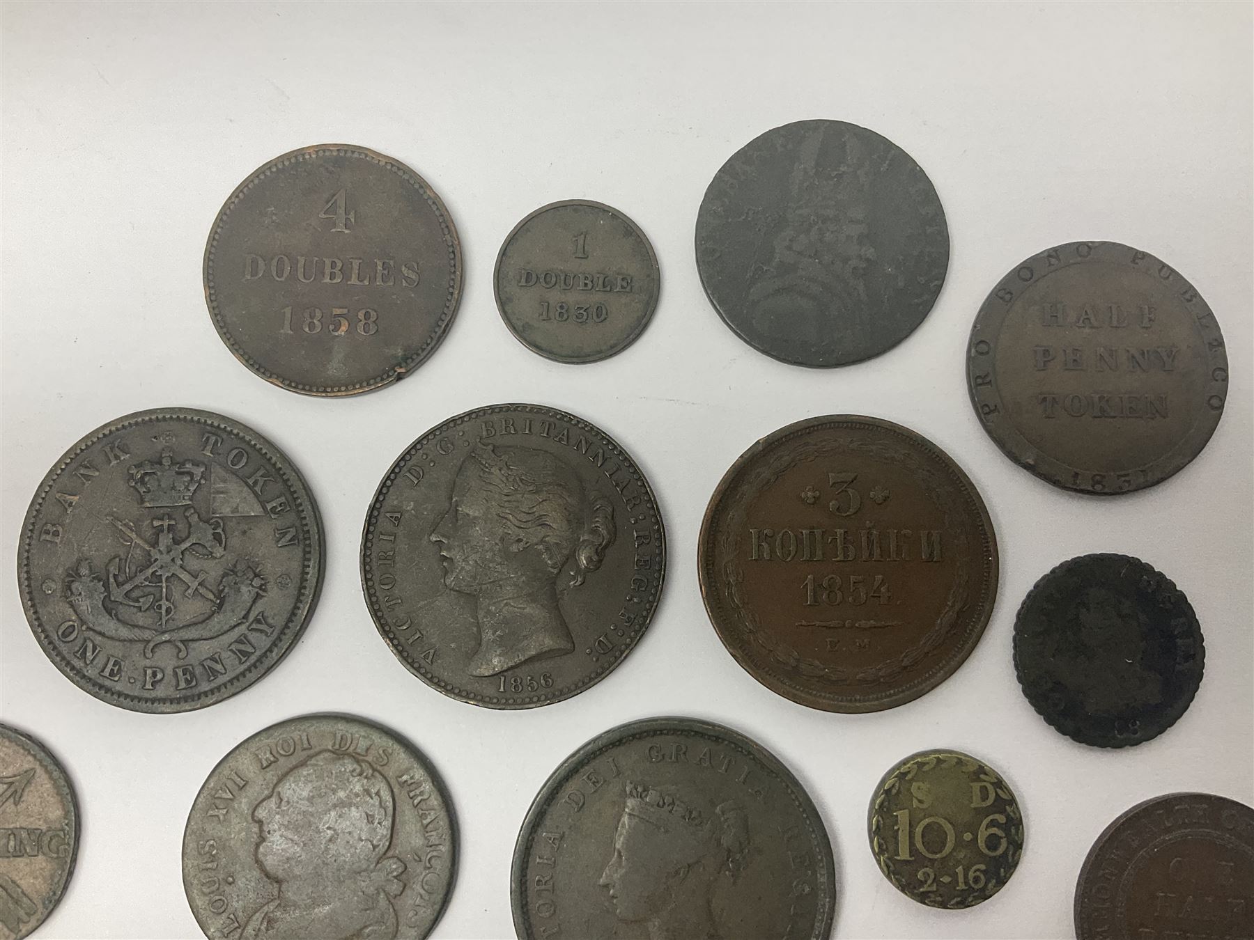 Thirty six late 18th century and onwards United Kingdom and World coins and tokens, to include 1772 Catherine II 5 Kopecks, Swedish quarter and half Skilling pieces dated 1809 and 1806, two Skilling Courant piece dated 1810, 1831 Isle of Man half penny token etc 