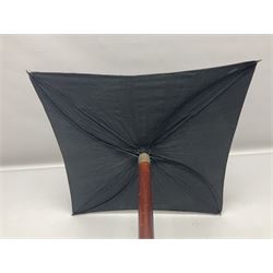 Victorian magician's cane, the mahogany walking stick twisting apart to reveal an internal mechanism, opening to tripod and black silk fold out magician's table, with horn handle and silver mount, hallmarked Birmingham 1891