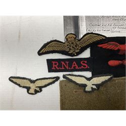 WW1 British Army Derby Scheme 1915 Attested armband; beret with East Yorkshire cap badge; pair of fur lined leather flying/motorcycle goggles; HMS Pembroke cap band; and small quantity of RNAS cloth and metal badges etc