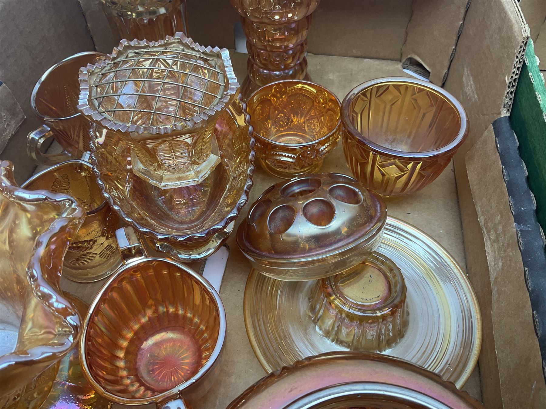 Collection of orange carnival glass, including jugs, dishes, vases etc, in two boxes 