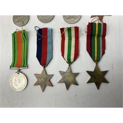 Eight WW2 medals comprising two War Medals 1939-1945, two Defence Medals, Atlantic Star, Italy Star, Pacific Star and 1939-1945 Star; all with ribbons (8) 
