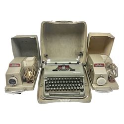Olympia cased typewriter, together with two Aldis projectors 