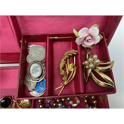 9ct gold necklace, stamped 9K, silver cubic zirconia flower cluster pendant necklace, stamped 925 and a collection of costume jewellery in a musical box