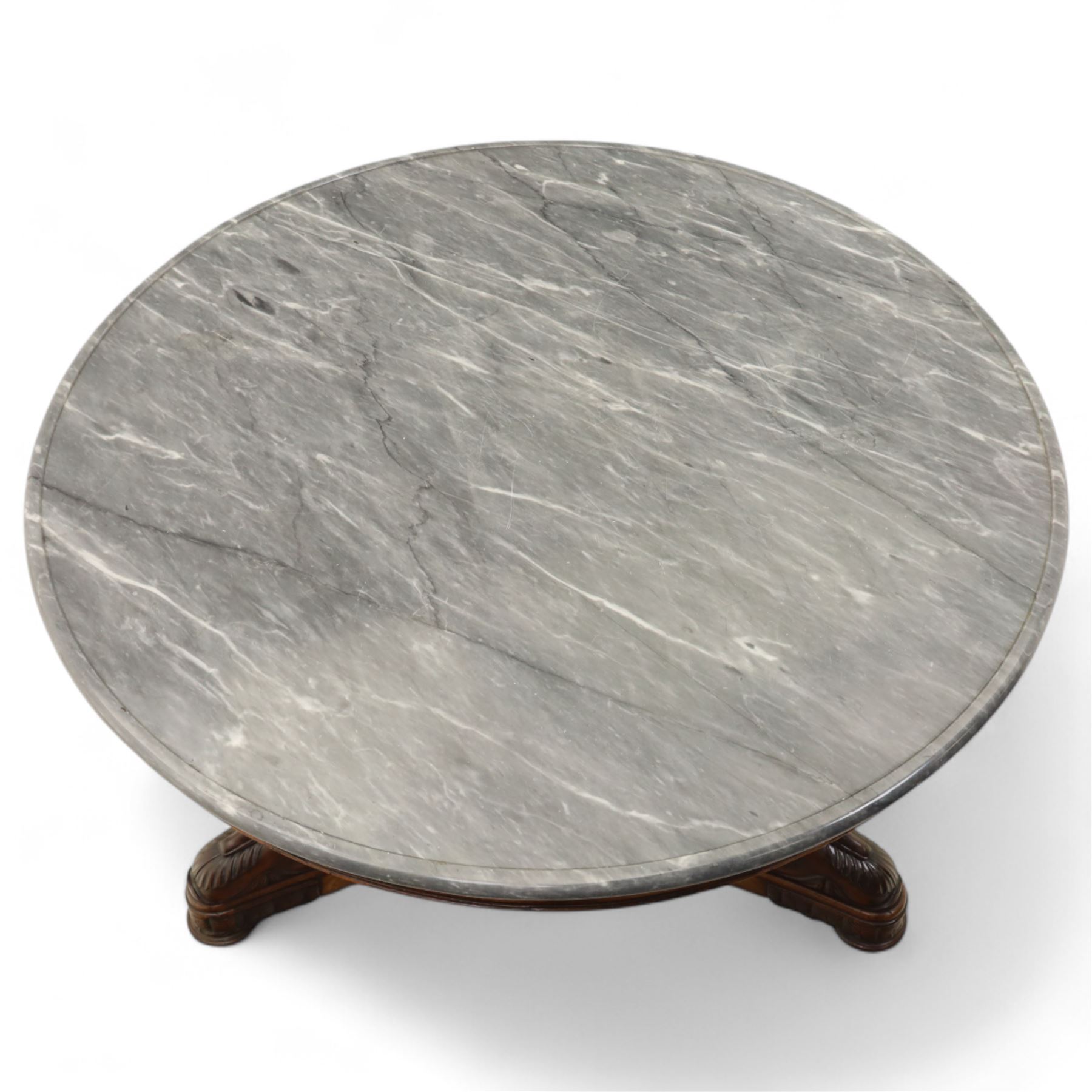 French mid-19th-century Second-Empire mahogany centre table with a dished grey-veined marble top, on a tapered triform pedestal with anthemion brass mounts above carved recumbent swan figures with delicately refined wings and graceful necks curving backwards, associated with the Empress Josephine, raised on three small platform bases