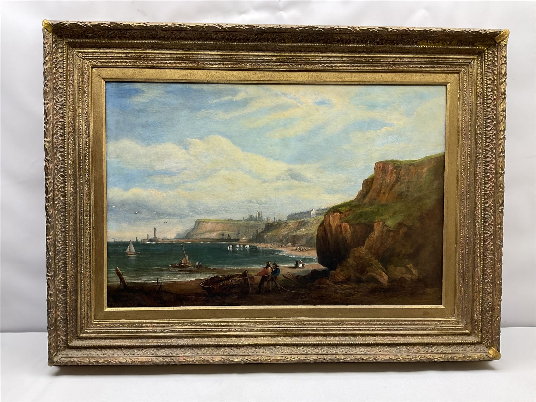 George Chambers Jnr. (British 1829-1878): Whitby from Upgang with Bathing Machines and Figures on the Beach, oil on canvas signed and dated '73, 59cm x 90cm