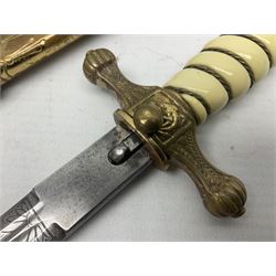 WW2 German kreigsmarine style dagger composed from various age parts, the post-war 25cm double fullered blade  with etched decoration and inscribed WKC with knight's head; in gilt brass scabbard with two rings L42cm overall