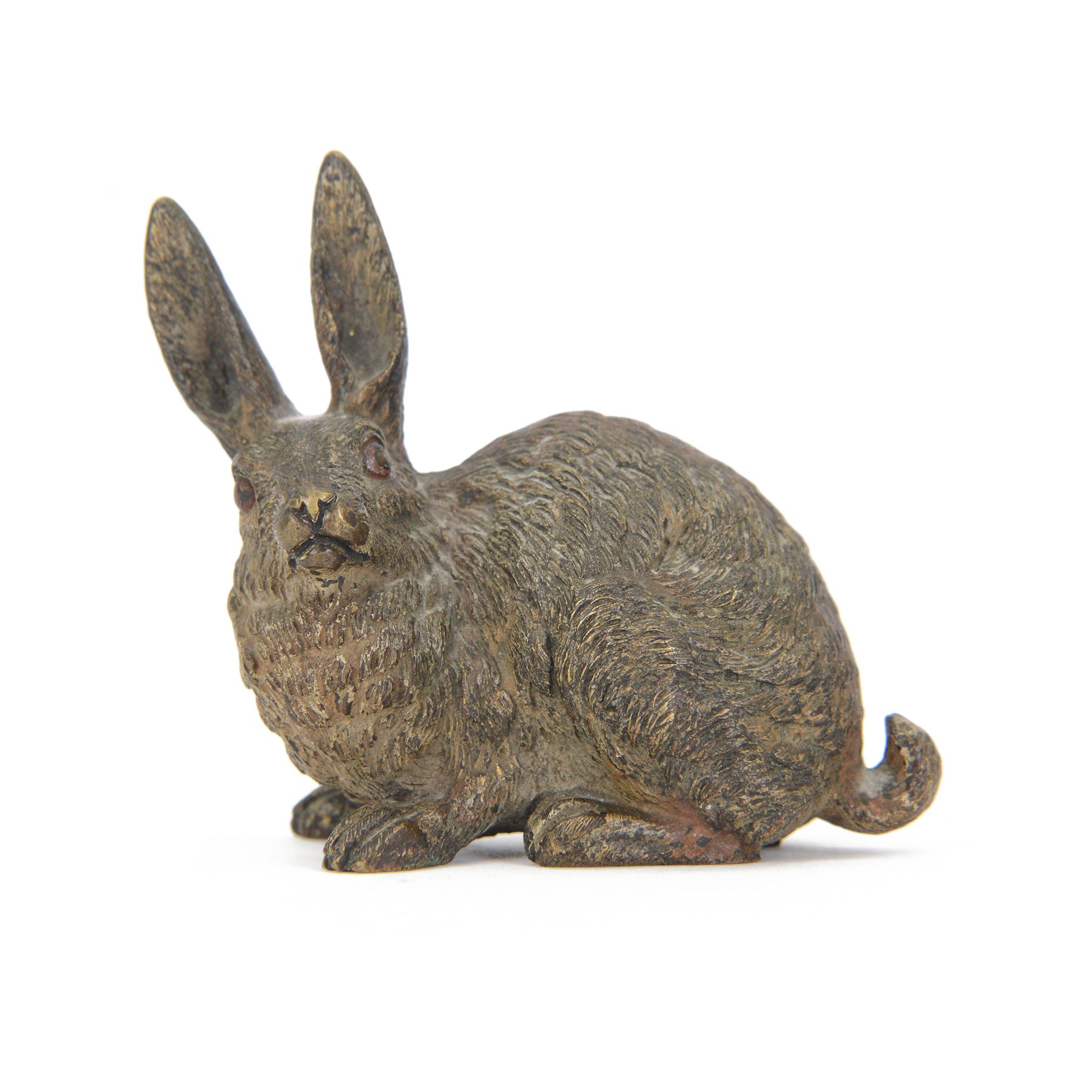 In the manner of Franz Bergman, seated hare, late 19th/early 20th century Austrian cold painted bronze, with indistinct impressed mark beneath, H8cm L9.5cm