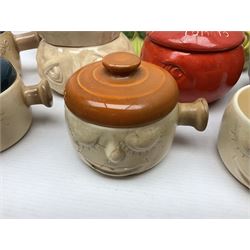 Collection of mostly Sylvac kitchen storage jar face pots, including piccalilli, chutney, tomato and bread sauce, tallest H15.5cm