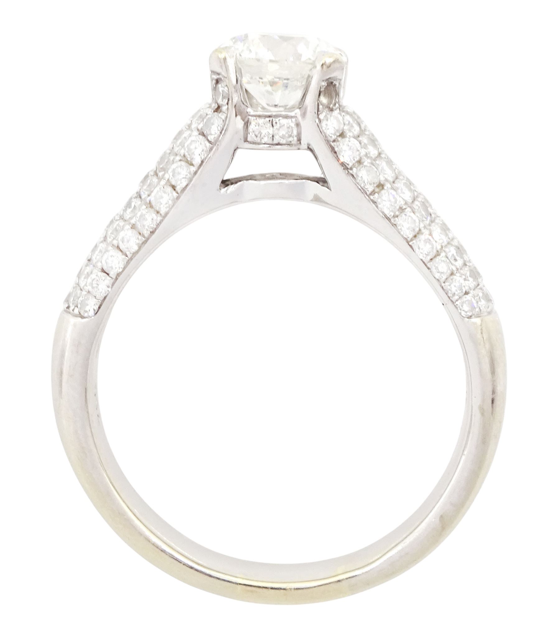 18ct white gold diamond ring, set with a single round brilliant cut diamond of approx 1.10 carat, five row pave set diamond shoulders and gallery, stamped 750, total diamond weight approx 1.50 carat