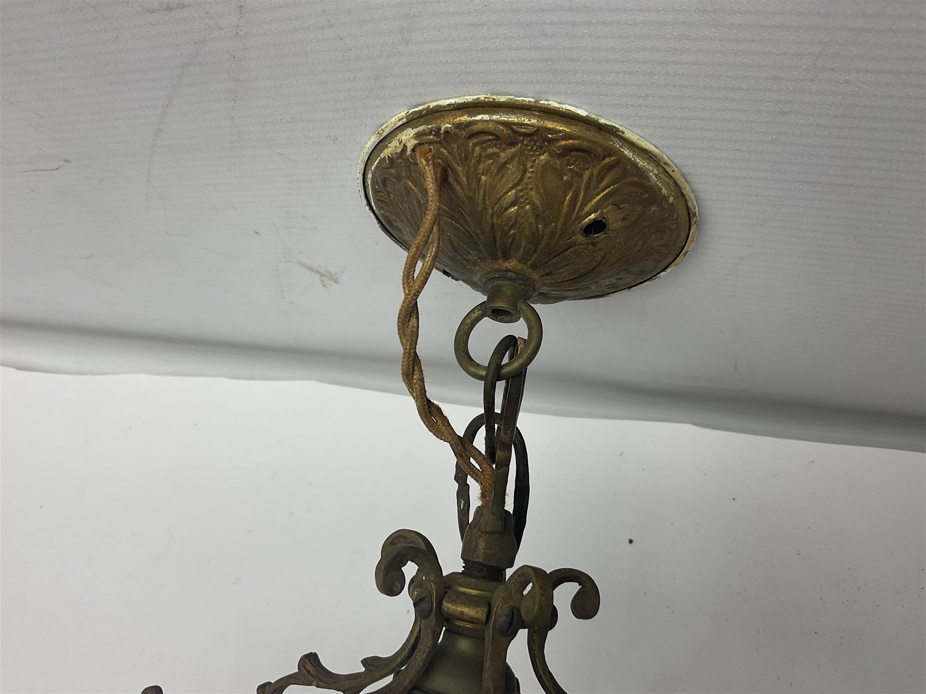 Edwardian floral cast gilt brass hall lantern of tapered pentagonal form, the five glass panels with etched decoration, overall approx L36cm excl chain