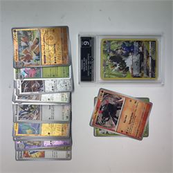 Collection of modern Pokemon TCG trading cards from the Scarlet & Violet and Sword & Shield eras, contained within in two folders, opened packets and loose, together with a graded Sword & Shield Silver Tempest Passiman TG08, GET Graded 9 Mint, two oversized cards, energy cards, vintage booklets and boxes, empty tins, 1998 Electronic Pokédex and other accessories