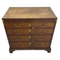 George III mahogany chest, banded caddy top with moulded edge, brushing slide over four graduating cock-beaded drawers, ornate cast gilt metal handle plates and escutcheons, swan neck handles cast with dolphins, shells and C-scrolls, lower moulding over bracket feet
