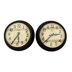 A pair of large 1950’s “Smiths” sectric  clocks with synchronous mains driven electric motors,
With 17-1/2” diameter painted dials, housed in 23” diameter cases, with Arabic numerals, minute markers and Steel baton hands. 

.

