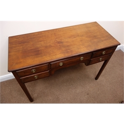  Edwardian mahogany writing table dressing table, moulded top, four short and two long drawers, square supports, W115cm, H78cm, D51cm  