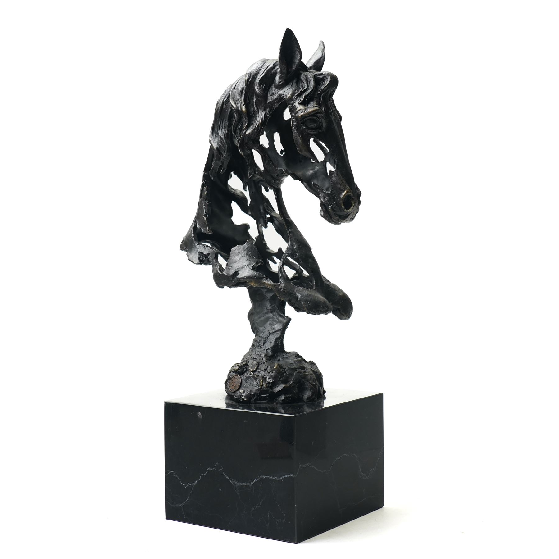 Stylised horse head, bronze, signed Gadi and bearing foundry mark, upon black stone square plinth, overall H41cm