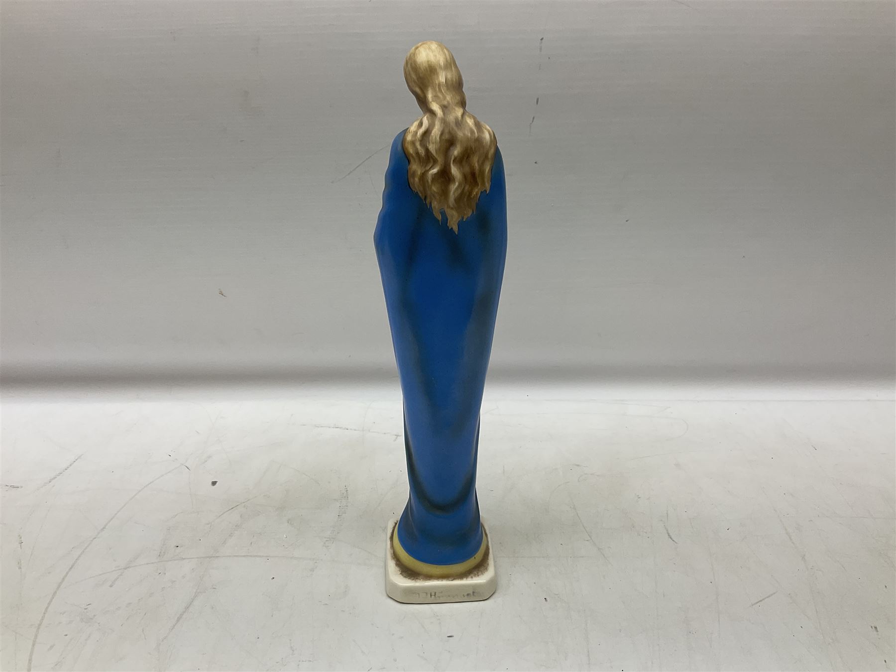 Hummel figure of a praying Saint together with a figure of a seated girl with deer, largest H40cm (2)