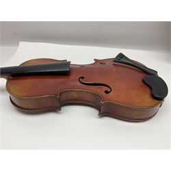 Late 19th century French three-quarter size 'Conservatory' violin with 34cm two-piece maple back and ribs and spruce top, the peg box inscribed 'Conservatory Violin Straduari', bears label 'Antonius Stradiuarius Cremonensis Faciebat Anno 1721' L55.5cm overall; in ebonised wooden 'coffin' case; and Saxony violin c1900 with 36cm two-piece maple back and ribs and spruce top; bears label 'Antonius Stradivarius Cremonensis Faciebat Anno 17**' L59cm overall; in carrying case (2)