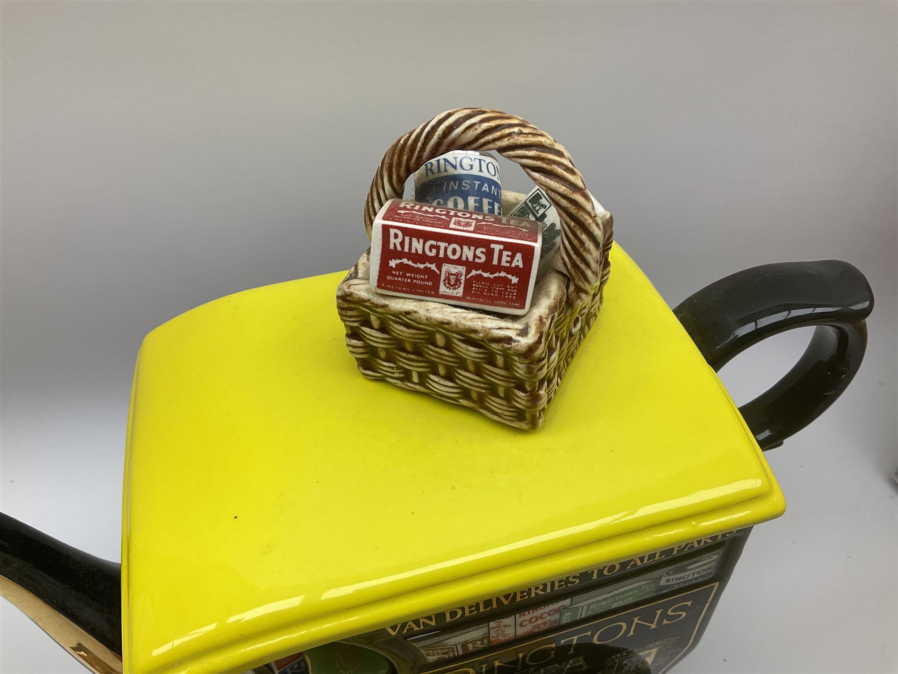 Ringtons novelty teapots, comprising the Ringtons Delivery Van teapot, and the Tea Merchant teapot, both with boxes and certificates of ownership.
