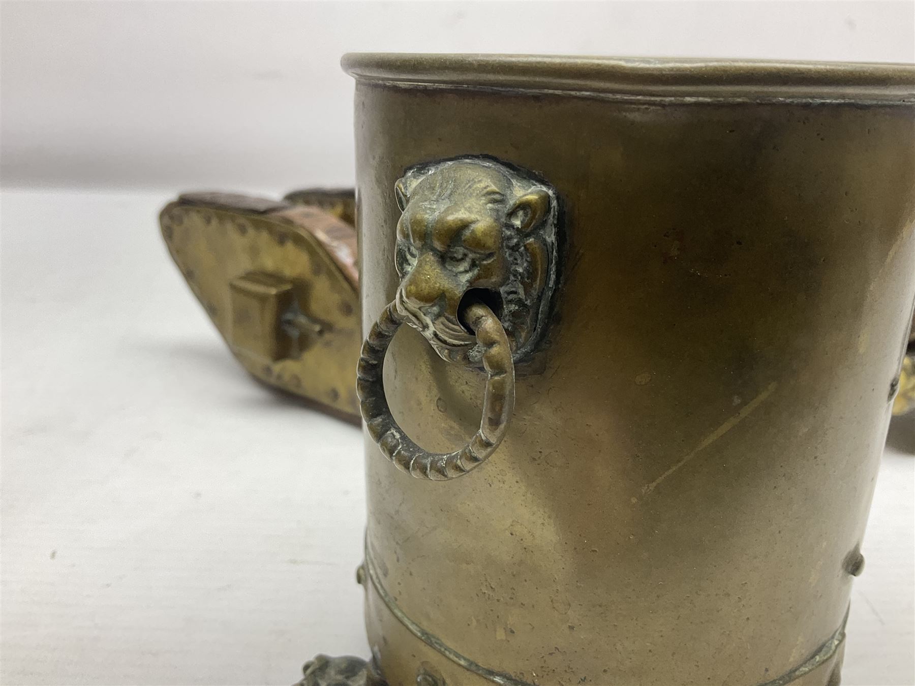Trench Art - WWI 0-8-0 steam locomotive made from brass, copper and late Victorian pennies and half-pennies L17.5cm; WWI brass and copper tank candleholder; WWI brass shell case two-handled vase inscribed 'RFA France 1914-17'; and an unrelated brass plant holder (4)