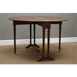  19th century oak Pembroke table, oval drop leaf top, turned and fluted pillar supports and gateleg action, 102cm x 134cm, H72cm  
