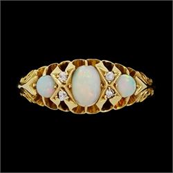 Edwardian 18ct gold opal and diamond ring, three cabochon cut opals, the principal stone w...