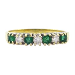18ct gold seven stone emerald and round brilliant cut diamond ring, Birmingham 1989
