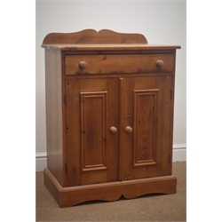  Pine side cabinet, raised back, single drawer, two cupboard doors, shaped plinth base, W66cm, H90cm, D41cm  