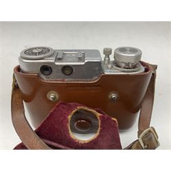 Diax IIa Rangefinder camera body with 50mm f/2.8 Xenar lens, in leather camera case