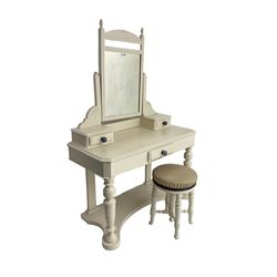Edwardian cream painted dressing table, fitted with rectangular swing mirror over two trinket drawers with ceramic handles, rectangular top with frieze drawer, raised on turned front supports; with circular stool, leather seat over four turned supports