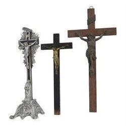 Eight crucifixes with Corpus Christi, various ages and materials, including wood and medal examples, largest H120cm 