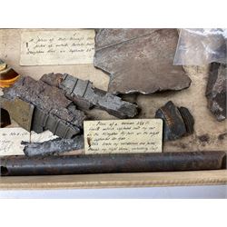 Small collection of WW2 shrapnel and German and British shell parts, most with manuscript details of where and when found including London, Leeds, Bristol, Linton-on-Ouse etc