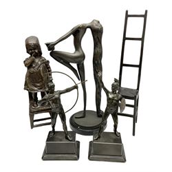Bronze figure of a female nude with long flowing hair in stretched pose raised on circular base, supporting candlestick holder, together with bronze figure of a girl stood upon a chair, two warrior figures etc (5)
