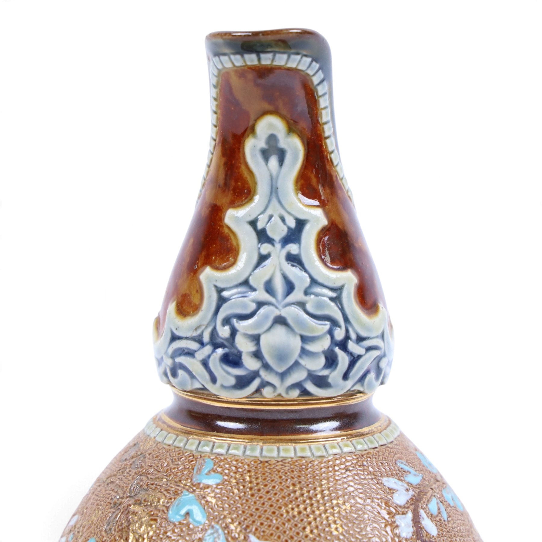 Pair of Doulton Lambeth ewers, decorated with a lace-impressed body decorated with floral sprigs, H16cm