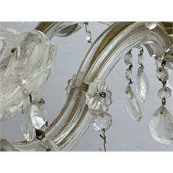 Victorian style glass eight branch chandelier, with drip trays, brass tone support, and drops