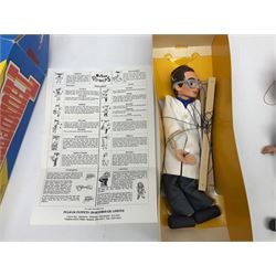 Three Pelham puppets - 'Brains' from Thunderbirds in blue/yellow box; Witch in yellow window box; and Macboozle in brown box (3)