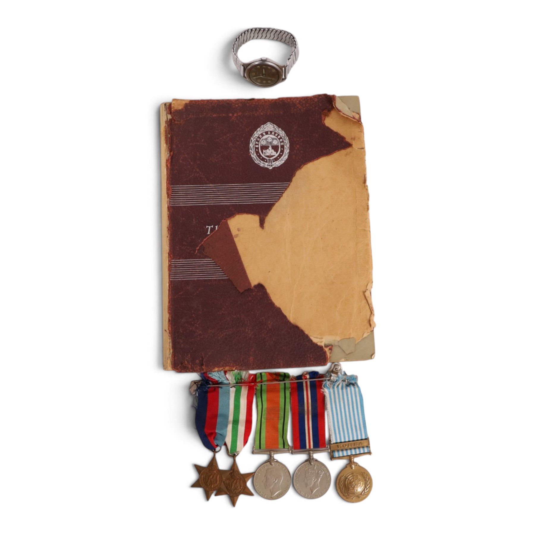 WWII British Army Dirty Dozen Cyma Wrist Watch, back of case WWW P 9953 14953 with broad arrow, together with WWII medal set comprising 1939-1945 Star, Italy Star, Defence medal, War Medal and Korean medal, all awarded to John Armitage Wilby, together with book Their Finest Hour, in which John Wilby is listed 