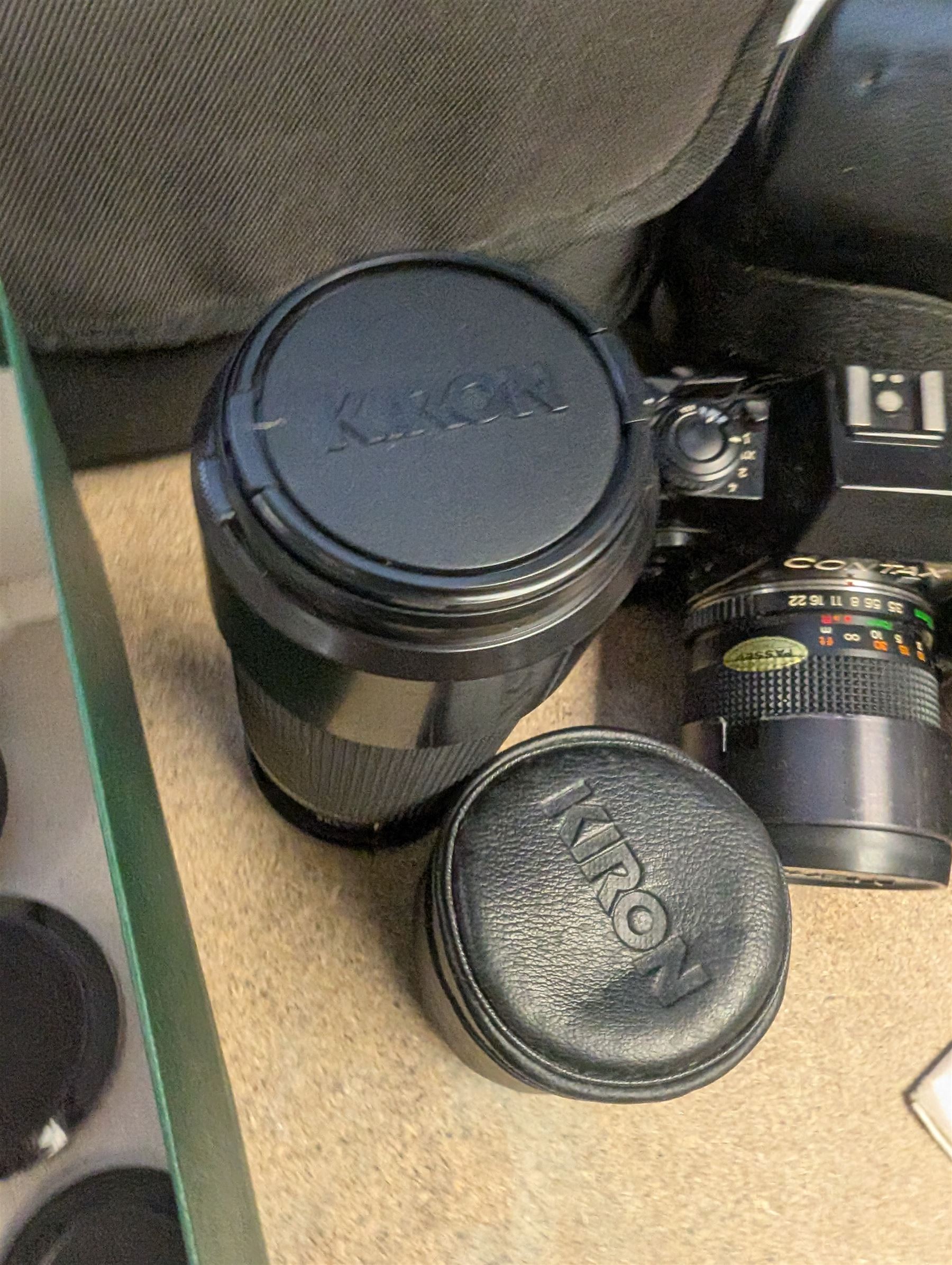 Contax SLR camera with a Yashica ML Zoom 42-75mm 1:3.5-4.5 lens, in case with accessories, together with a Yashica FX-D Quartz SLR camera with a Carl Zeiss Planar 1.7/50 lens, with filters, instruction booklets and other accessories