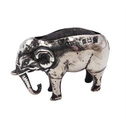 Edwardian silver mounted novelty pin cushion, in the form of an elephant, with cushioned back, hallmarked Birmingham 1906, maker's mark worn and indistinct, L4cm, H3.5cm