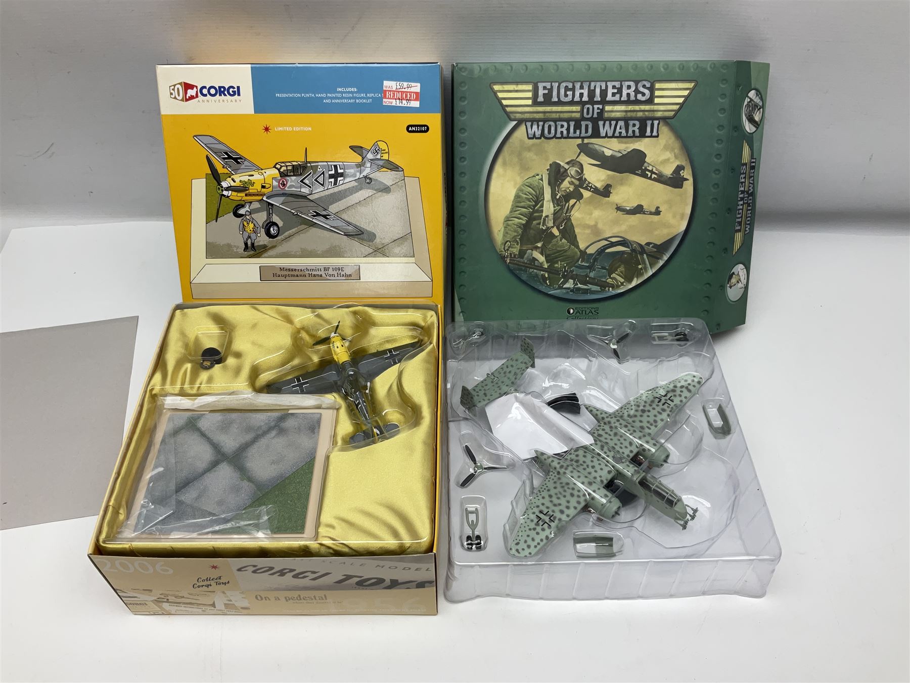 Fifteen modern die-cast models of aircraft by Corgi, Atlas Editions and Ixo including Aviation Archive, War Birds, Fighters of WWII etc; and model of an MGB Sports Car; all boxed (16)